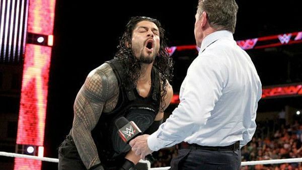 Roman Reigns and Vince McMahon